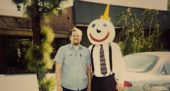 angel next to person in jack in the box restaurant  costume