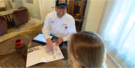 Clients reviewing paperwork